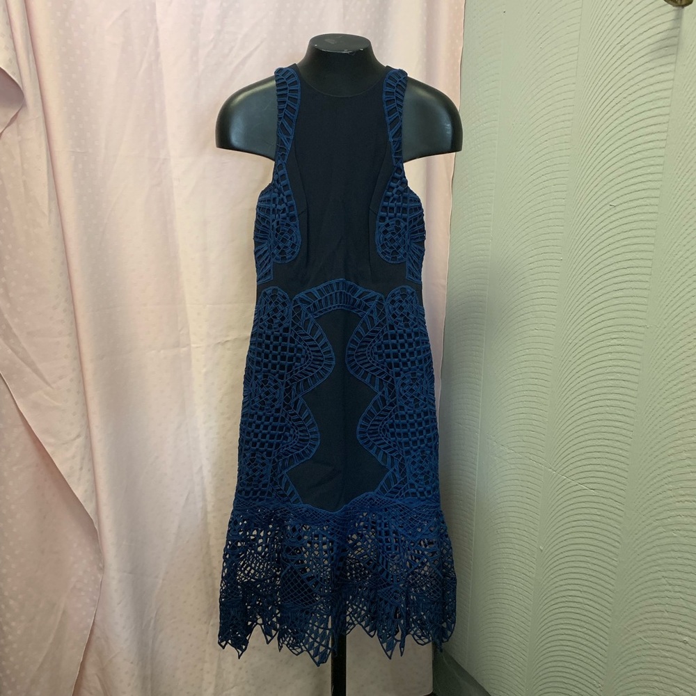 Jonathan Simkhai navy blue crochet dress.